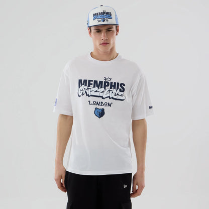 The model is wearing this NBA London Game 2026 Memphis Grizzlies Oversized T-Shirt in white. 1