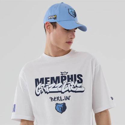 The model is wearing this NBA London Game 2026 Memphis Grizzlies Oversized T-Shirt in white. 6