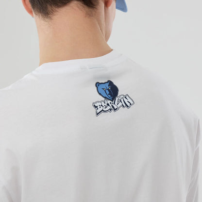 The model is wearing this NBA London Game 2026 Memphis Grizzlies Oversized T-Shirt in white. 4