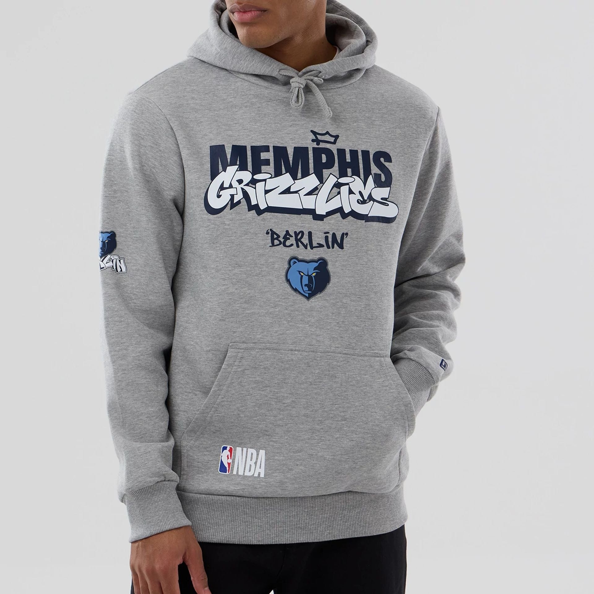 The model is wearing this NBA Berlin Game 2026 Memphis Grizzlies Pullover Hoodie in grey. 4