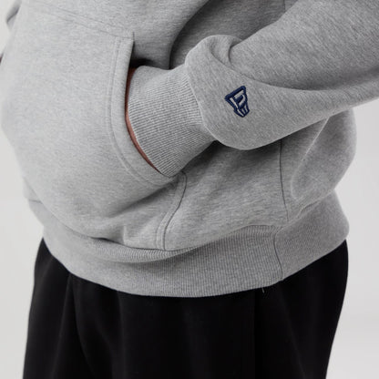 The model is wearing this NBA London Game 2026 Memphis Grizzlies Pullover Hoodie in grey. 4