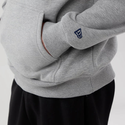 The model is wearing this NBA London Game 2026 Memphis Grizzlies Pullover Hoodie in grey. 4