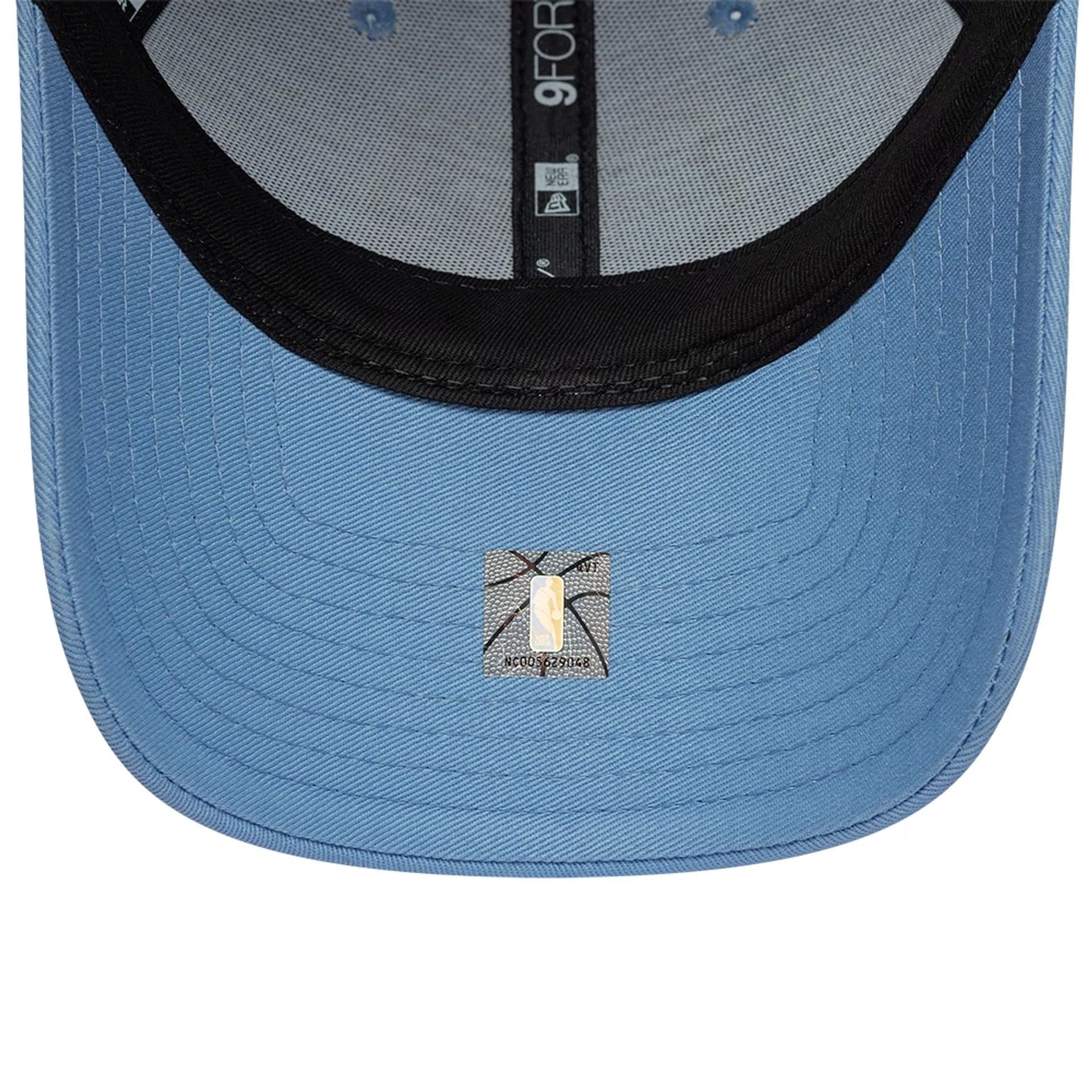 Pictured is this Memphis Grizzlies NBA Berlin Game 2026 Blue 9FORTY Adjustable cap. 7