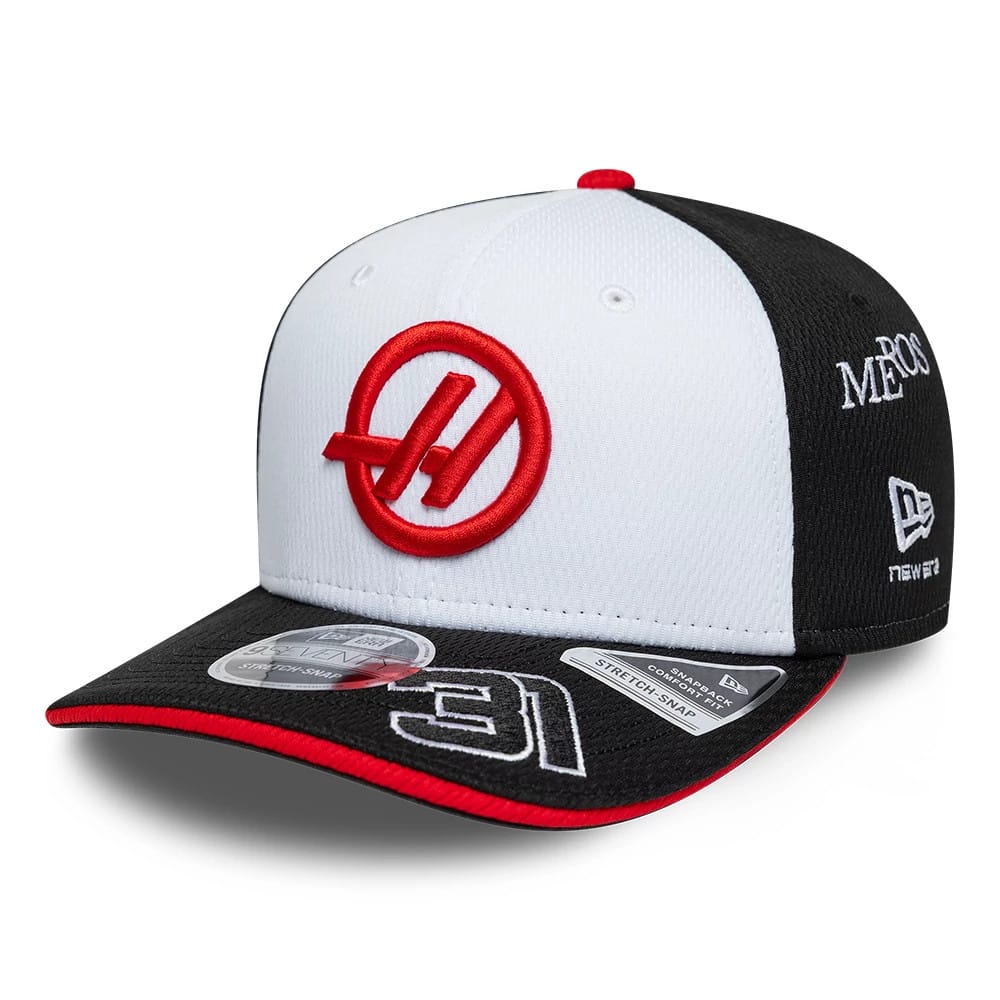 Pictured is this Esteban Ocon TGR Haas F1 9SEVENTY Stretch Snap cap in black. 1