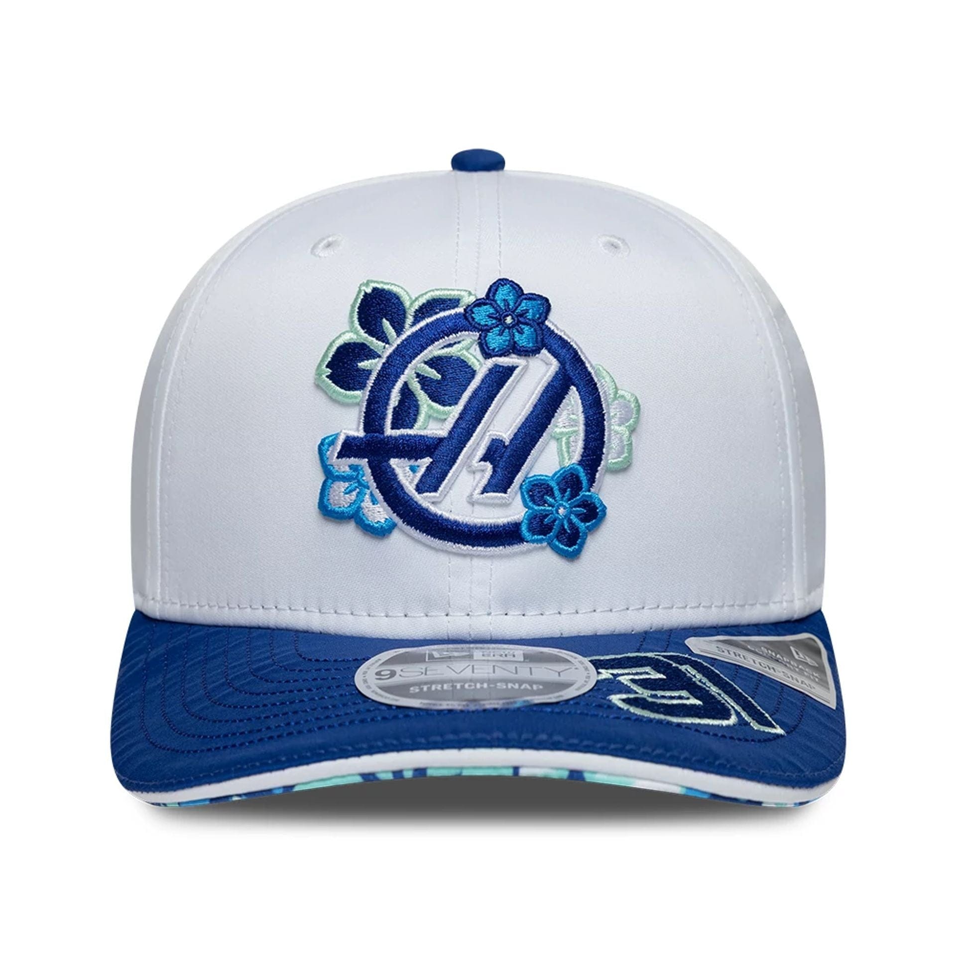 Pictured is this Esteban Ocon Japan Race Special TGR Haas F1 9SEVENTY Stretch Snap cap in white. 4