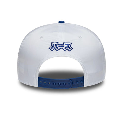 Pictured is this Esteban Ocon Japan Race Special TGR Haas F1 9SEVENTY Stretch Snap cap in white. 3