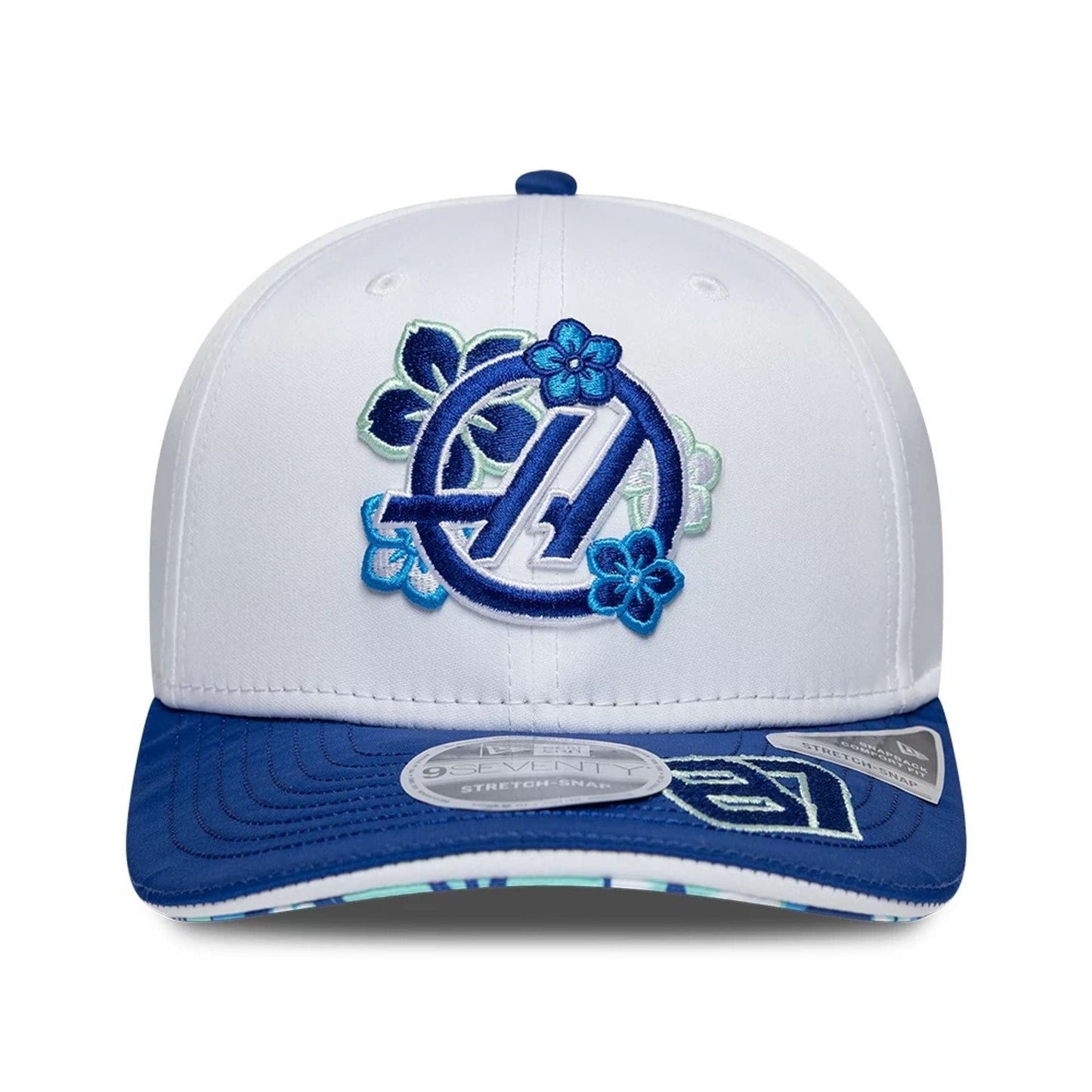 Pictured is this Oliver Bearman Japan Race Special TGR Haas F1 9SEVENTY Stretch Snap cap in white. 4