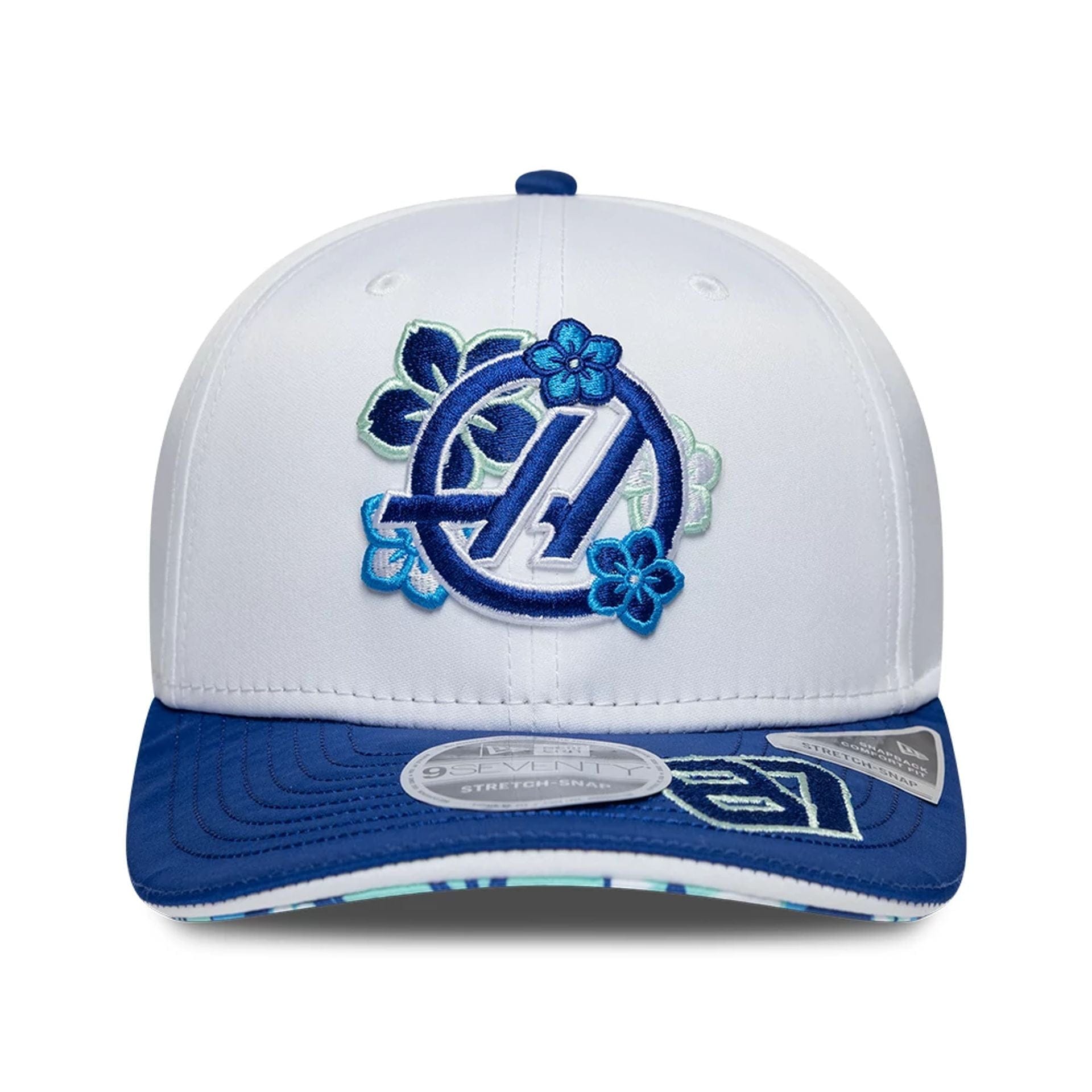 Pictured is this Oliver Bearman Japan Race Special TGR Haas F1 9SEVENTY Stretch Snap cap in white. 4