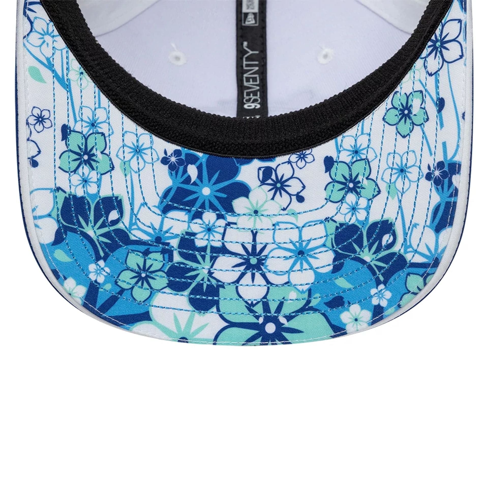 Pictured is this Oliver Bearman Japan Race Special TGR Haas F1 9SEVENTY Stretch Snap cap in white. 2