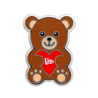 Pictured is this New Era Velentine Bear Pin Badge in Silver. 1
