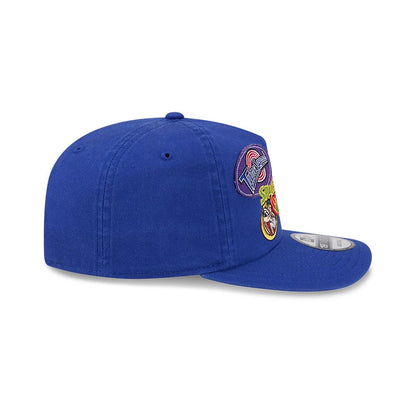 Space Jam Warner Brothers Space Jam Tune Squad Blue New Era 19TWENTY Cap, side view showing a curved visor with a 19TWENTY size sticker, an embroidered Tune Squad logo on the front panel, and structured blue crown with small top button.