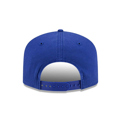 Space Jam Warner Brothers Space Jam Tune Squad Blue New Era 19TWENTY Cap, rear view showing the blue adjustable strap with multiple holes, a structured blue crown with matching top button, and reinforced blue eyelets on the back panels.