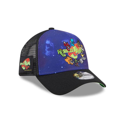 Space Jam Rivalry Black New Era 9FORTY A-Frame Trucker Adjustable Cap, three-quarter view showing colourful embroidered Space Jam characters on the blue front panel, a black curved visor with a 9FORTY size sticker.