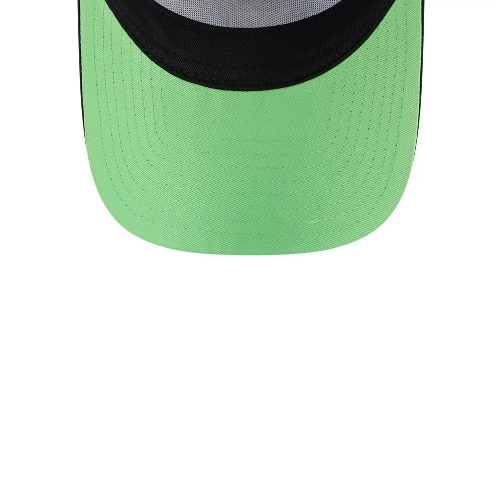 Space Jam Rivalry Black New Era 9FORTY A-Frame Trucker Adjustable Cap, inside view highlighting a bright green undervisor contrasting with the black outer visor and showing the structured mesh panels above.
