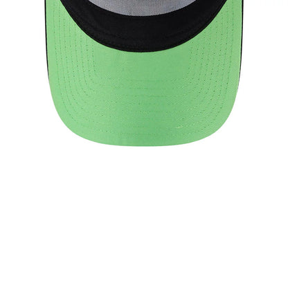 Space Jam Rivalry Black New Era 9FORTY A-Frame Trucker Adjustable Cap, inside view highlighting a bright green undervisor contrasting with the black outer visor and showing the structured mesh panels above.