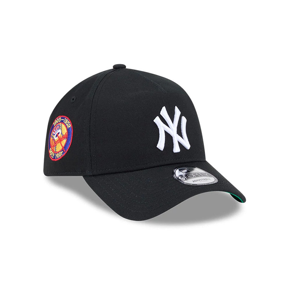 Yankees MLB Cooperstown Anniversary Black New Era 9FORTY A-Frame Adjustable Cap, three-quarter view showing the white raised embroidered NY logo on the front panel, a anniversary patch on the right side.