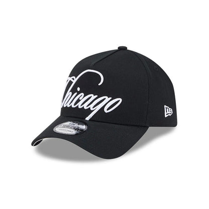 Chicago White Sox MLB Calligraphy Black New Era 9FORTY A-Frame Adjustable Cap, front view showing the raised white embroidered Chicago script on the structured black crown, curved black visor with 9FORTY size sticker.
