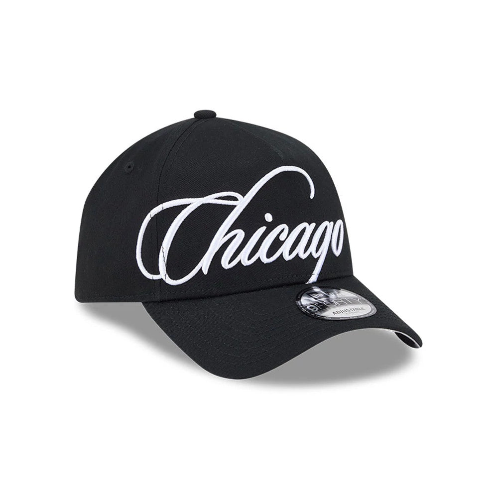 Chicago White Sox MLB Calligraphy Black New Era 9FORTY A-Frame Adjustable Cap, three-quarter view showing the white embroidered Chicago script on the front panel, curved black visor with a 9FORTY size sticker, and a structured black crown.