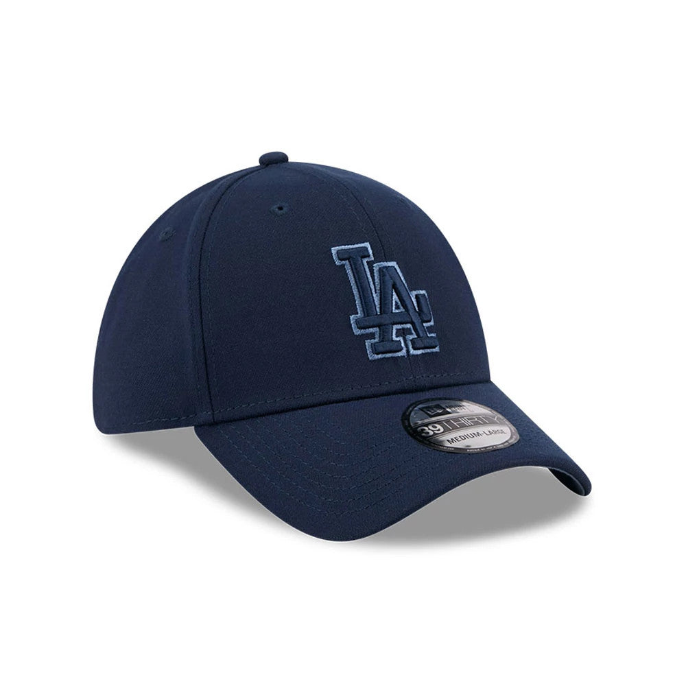 LA Dodgers MLB Faded Oceanside Dark Blue New Era 39THIRTY Stretch Fit Cap, three-quarter view showing the raised dark blue embroidered LA logo on the front panel, with a curved visor and a 39THIRTY size sticker on the crown.