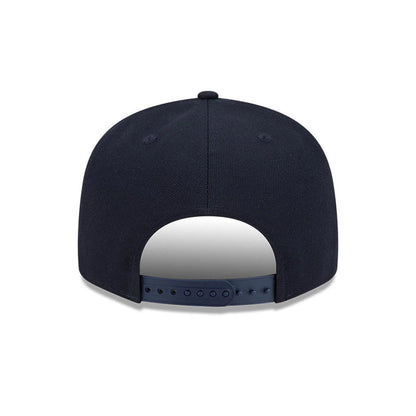 Yankees MLB Cooperstown Throwback Navy New Era 9FIFTY Snapback Adjustable Cap, rear view showing the navy crown with matching top button and two embroidered eyelets per panel above a navy adjustable snap closure.