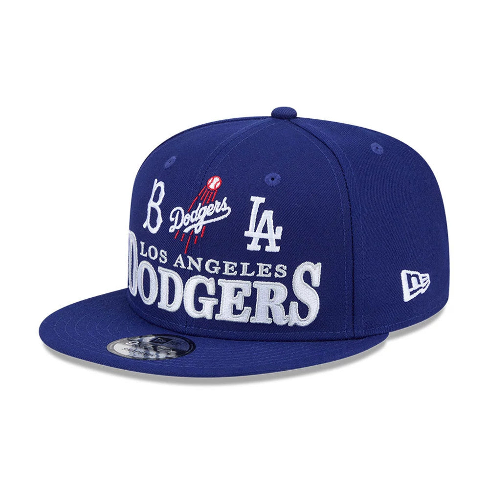 Pictured is this MLB Cooperstown Throwback LA Dodgers 9FIFTY Snapback cap in dark blue. 1