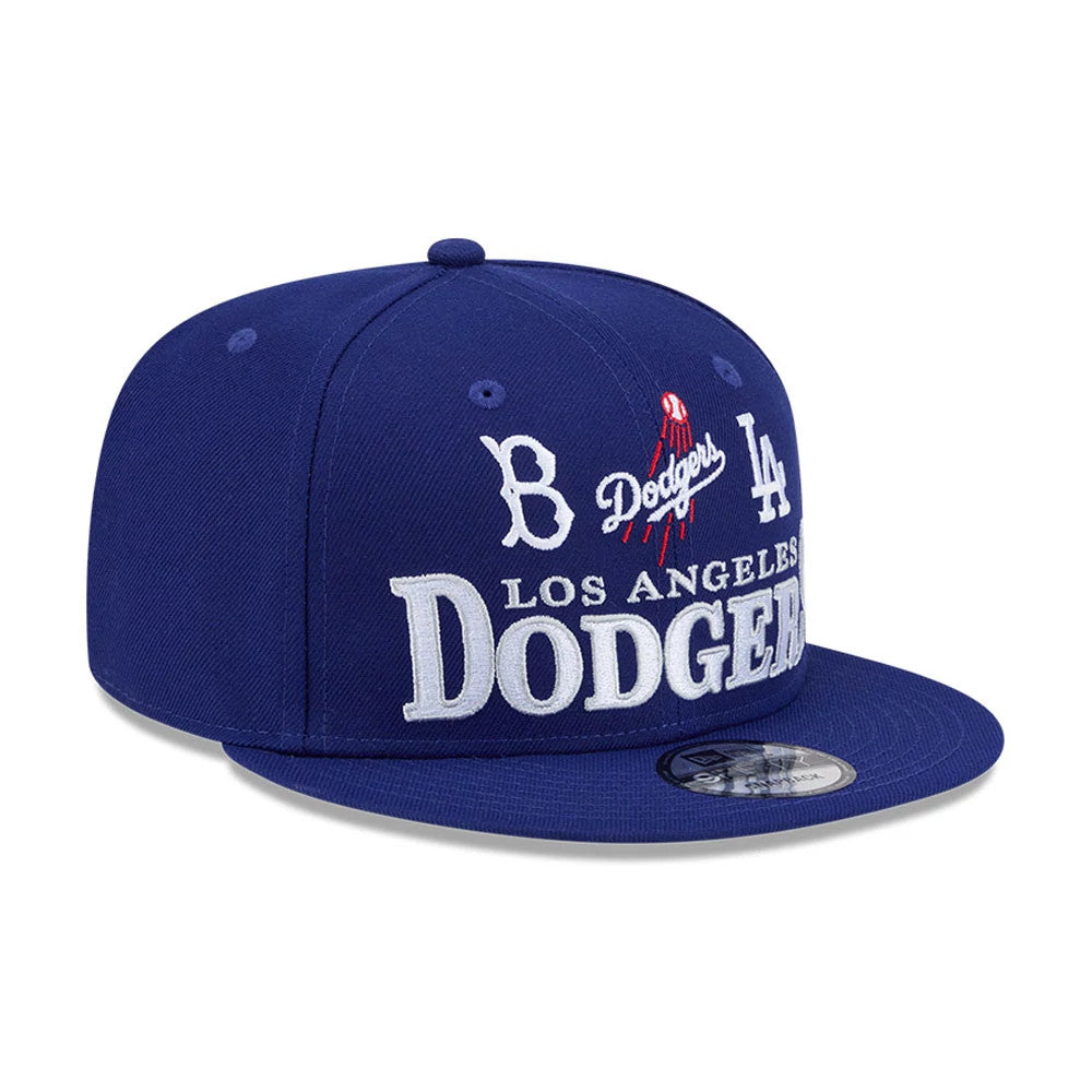 Pictured is this MLB Cooperstown Throwback LA Dodgers 9FIFTY Snapback cap in dark blue. 4
