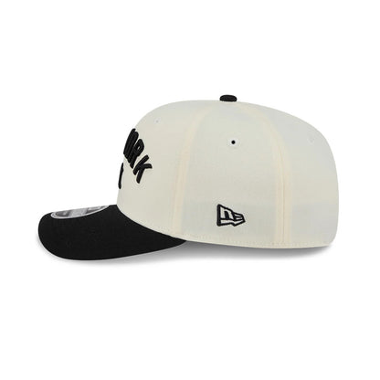 Pictured is this MLB 2 Tone New York Yankees 9SEVENTY Stretch Snap cap in cream & black. 5