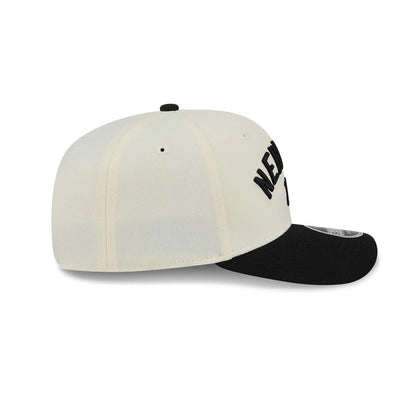 Pictured is this MLB 2 Tone New York Yankees 9SEVENTY Stretch Snap cap in cream & black. 6