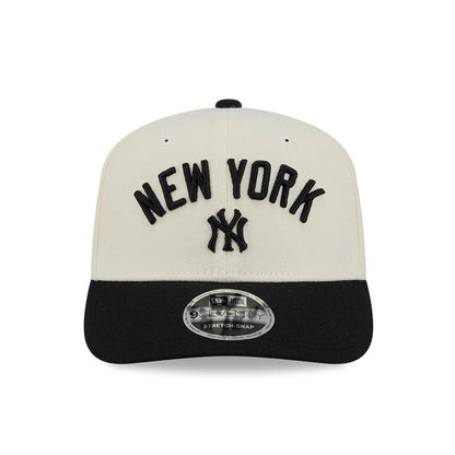 Pictured is this MLB 2 Tone New York Yankees 9SEVENTY Stretch Snap cap in cream & black. 3