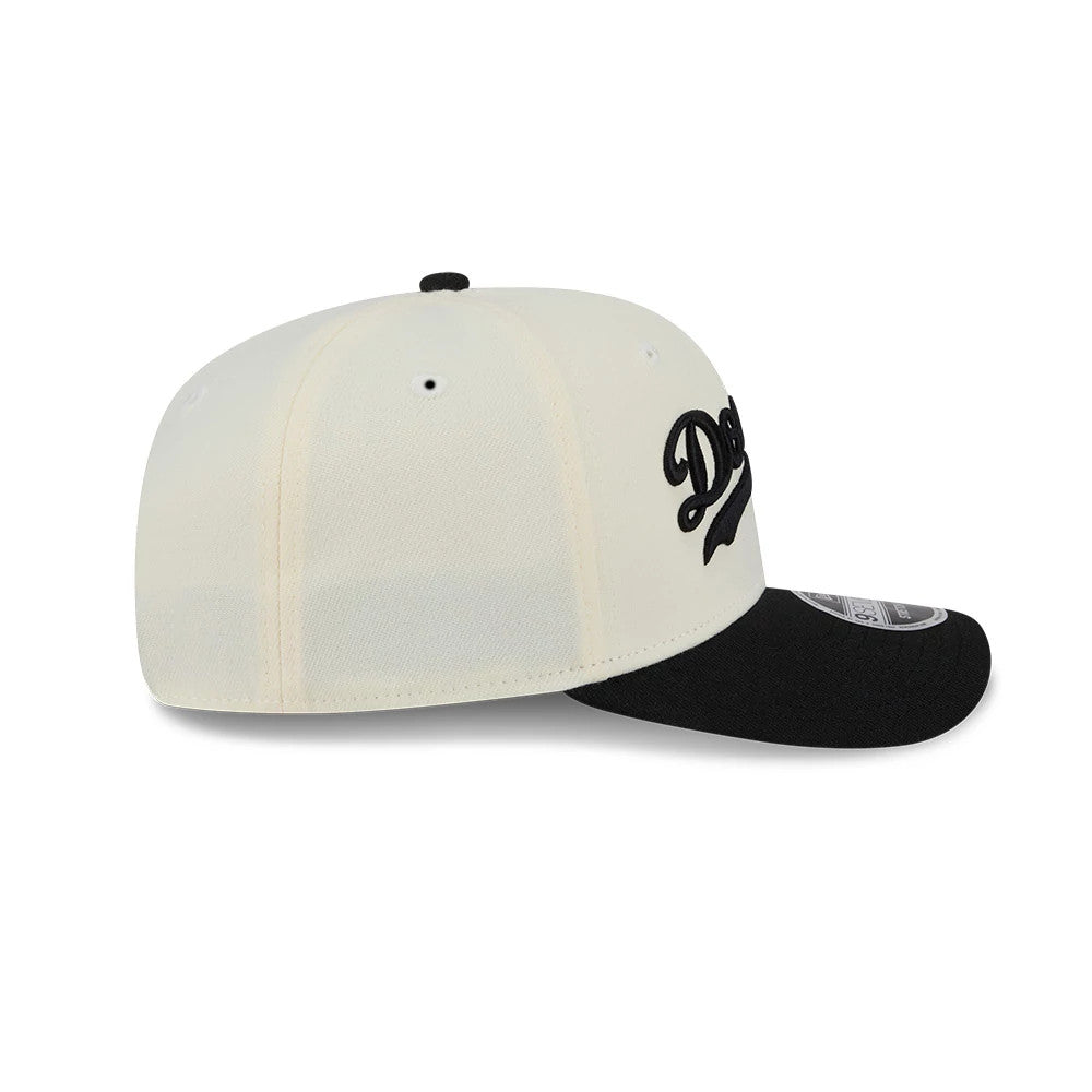 Pictured is this MLB 2 Tone LA Dodgers 9SEVENTY Stretch Snap cap in cream & black. 6