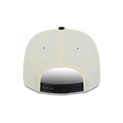 Pictured is this MLB 2 Tone LA Dodgers 9SEVENTY Stretch Snap cap in cream & black. 7