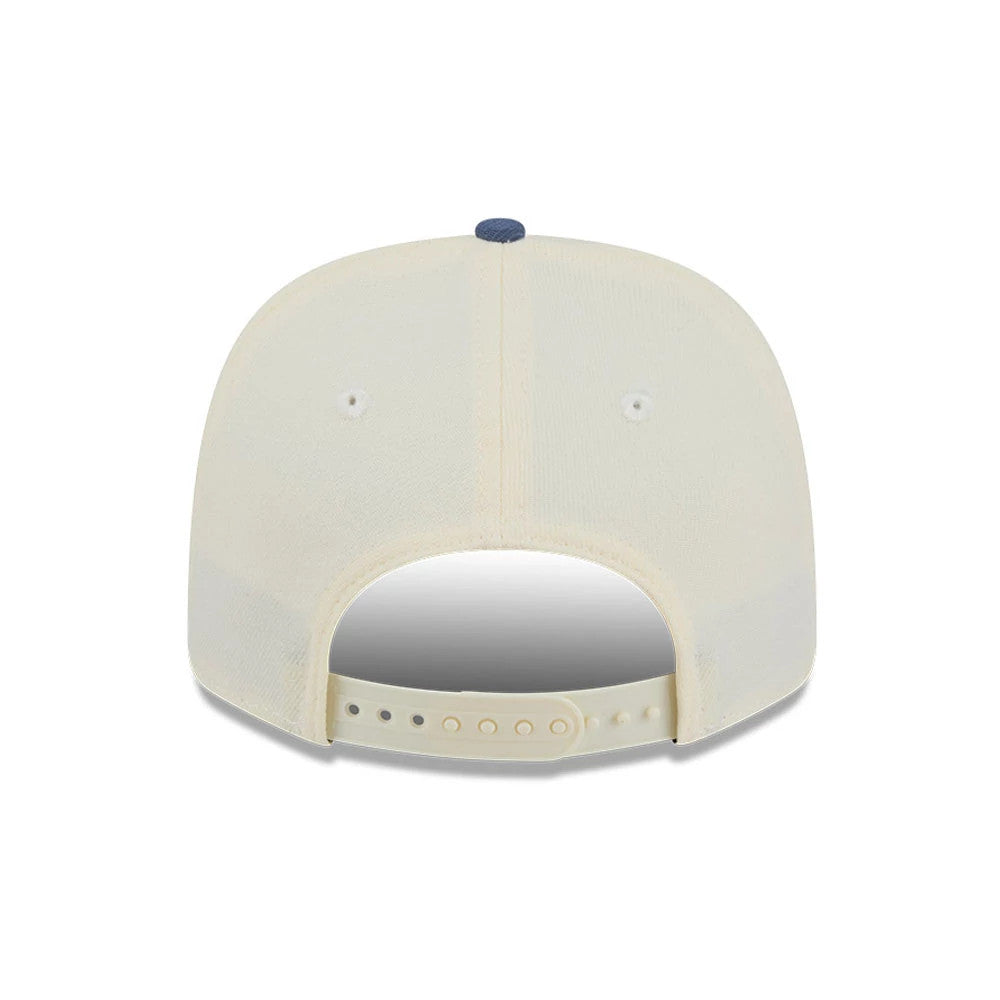 Pictured is this MLB Slate Stone New York Yankees 9SEVENTY Stretch Snap cap in cream & dark blue. 7