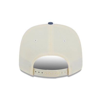 Pictured is this MLB Slate Stone New York Yankees 9SEVENTY Stretch Snap cap in cream & dark blue. 7