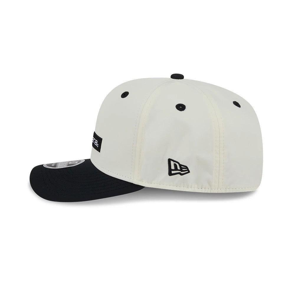 Pictured is this New Era Linear Logo 9SEVENTY Stretch Snap cap in white & black. 5