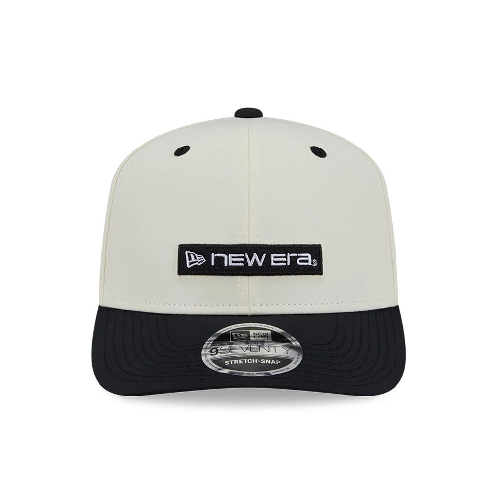 Pictured is this New Era Linear Logo 9SEVENTY Stretch Snap cap in white & black. 3