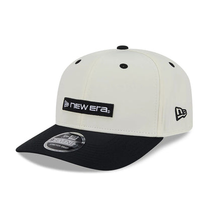 Pictured is this New Era Linear Logo 9SEVENTY Stretch Snap cap in white & black. 8