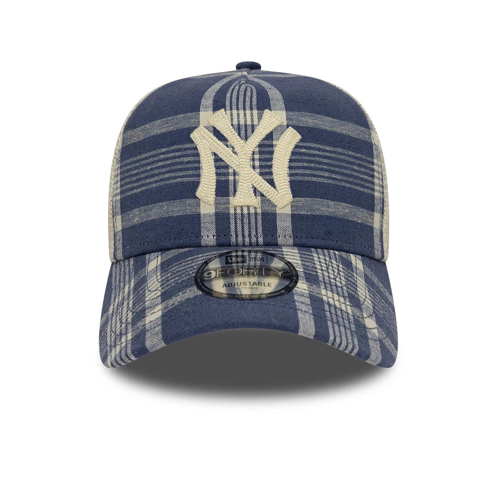 Ralph Lauren X MLB Yankees Blue New Era 9FORTY A-Frame Trucker Adjustable Cap, front view showing a prominent cream embroidered NY logo on a check pattern front panel, with a 9FORTY size sticker centred on the curved blue visor.