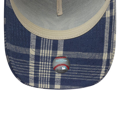 Ralph Lauren X MLB Yankees Blue New Era 9FORTY A-Frame Trucker Adjustable Cap, inside view showing a blue and cream plaid pattern on the undervisor, grey internal sweatband, and an official MLB holographic sticker centred underneath the visor.