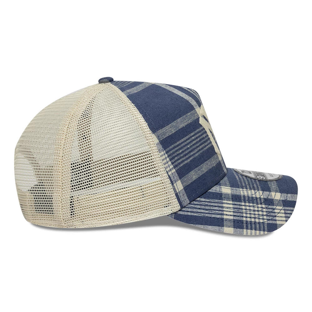 Ralph Lauren X MLB Yankees Blue New Era 9FORTY A-Frame Trucker Adjustable Cap, side view showing the white New Era flag logo on the left side of the structured blue and cream plaid front panel with a beige mesh back and curved visor.