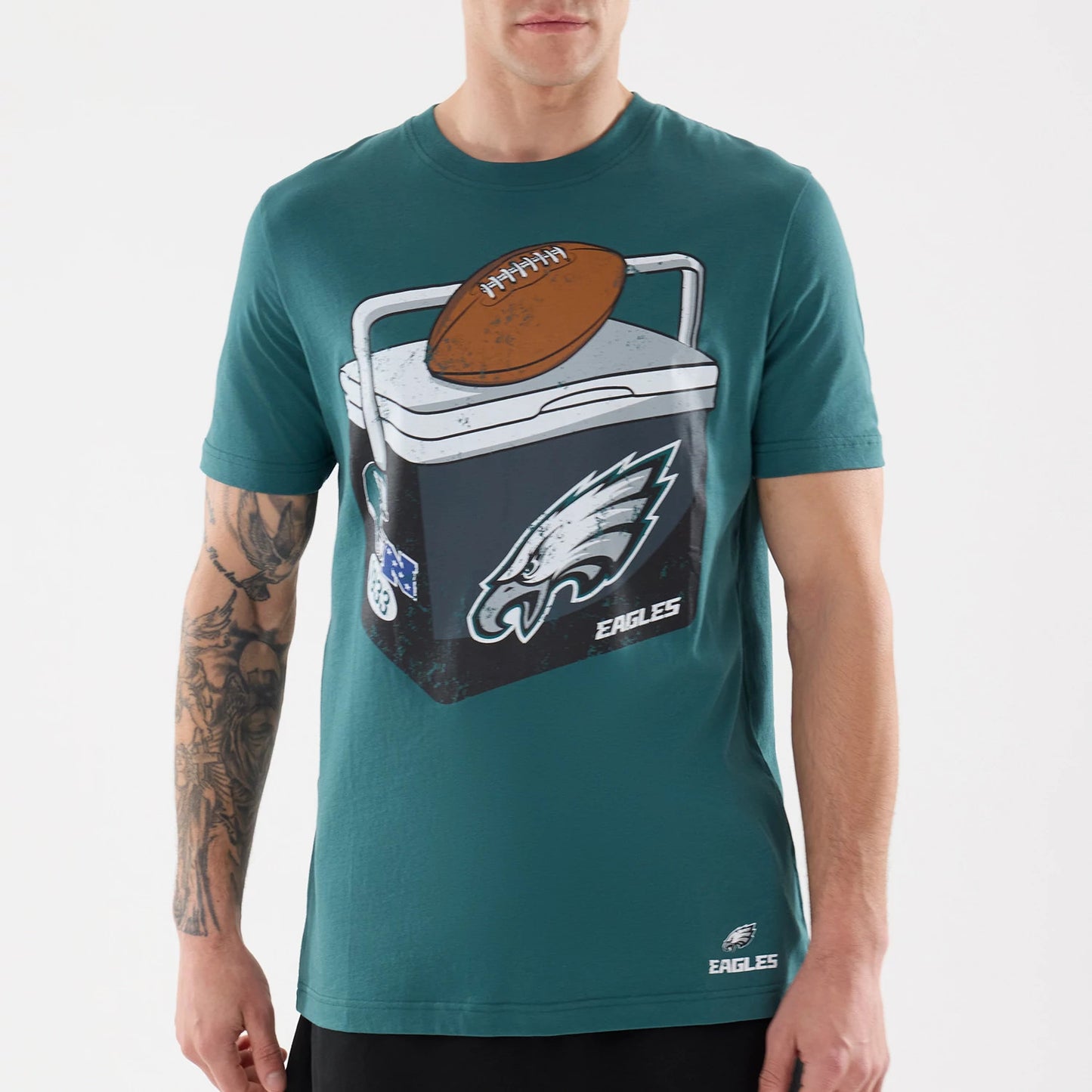 The model is wearing this NFL Training 2026 Philadelphia Eagles T-Shirt in dark green. 3