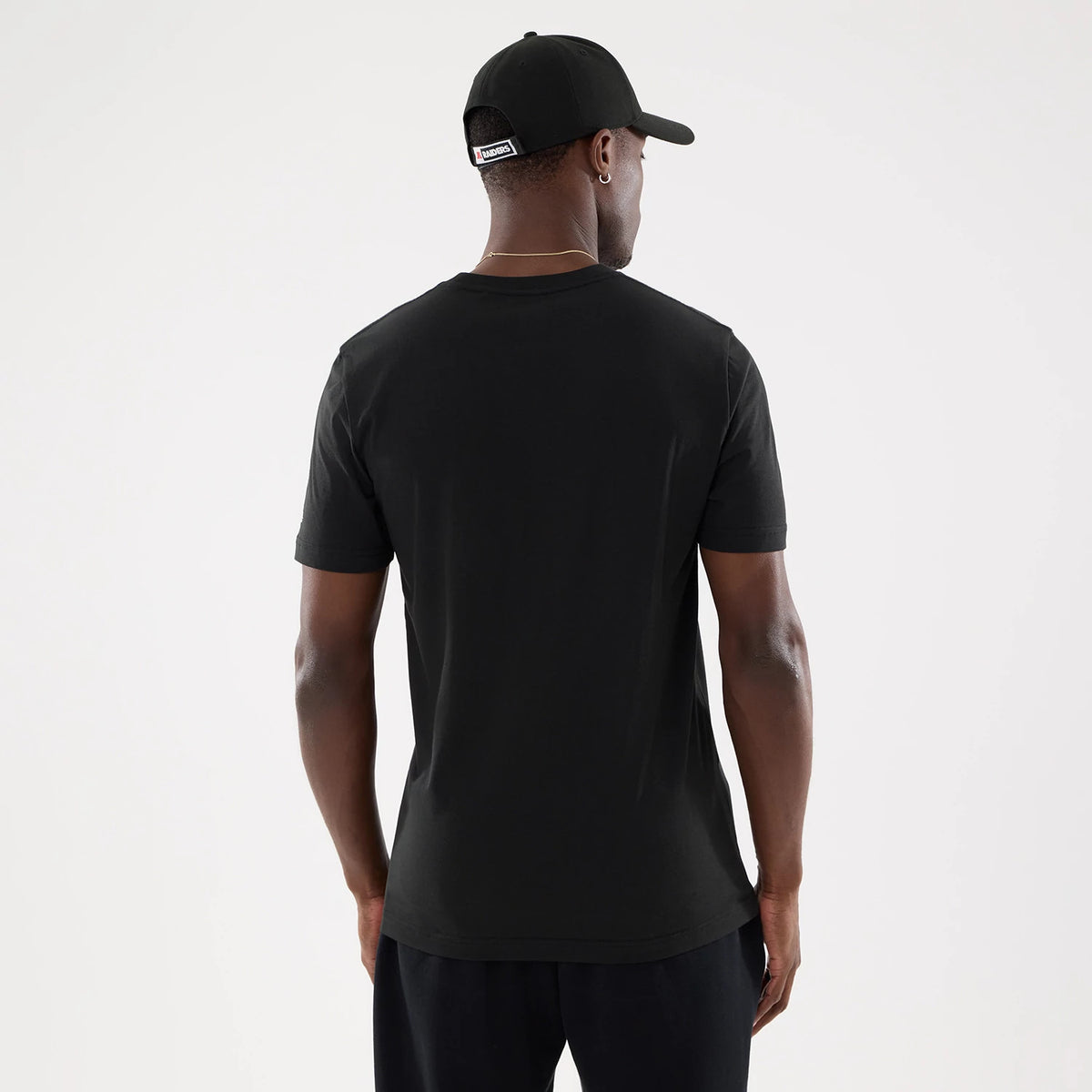 The model is wearing this NFL Training 2026 Las Vegas Raiders T-Shirt in black. 2