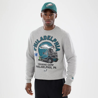 The model is wearing this NFL Training 2026 Philadelphia Eagles Crew Neck Sweater in grey. 1