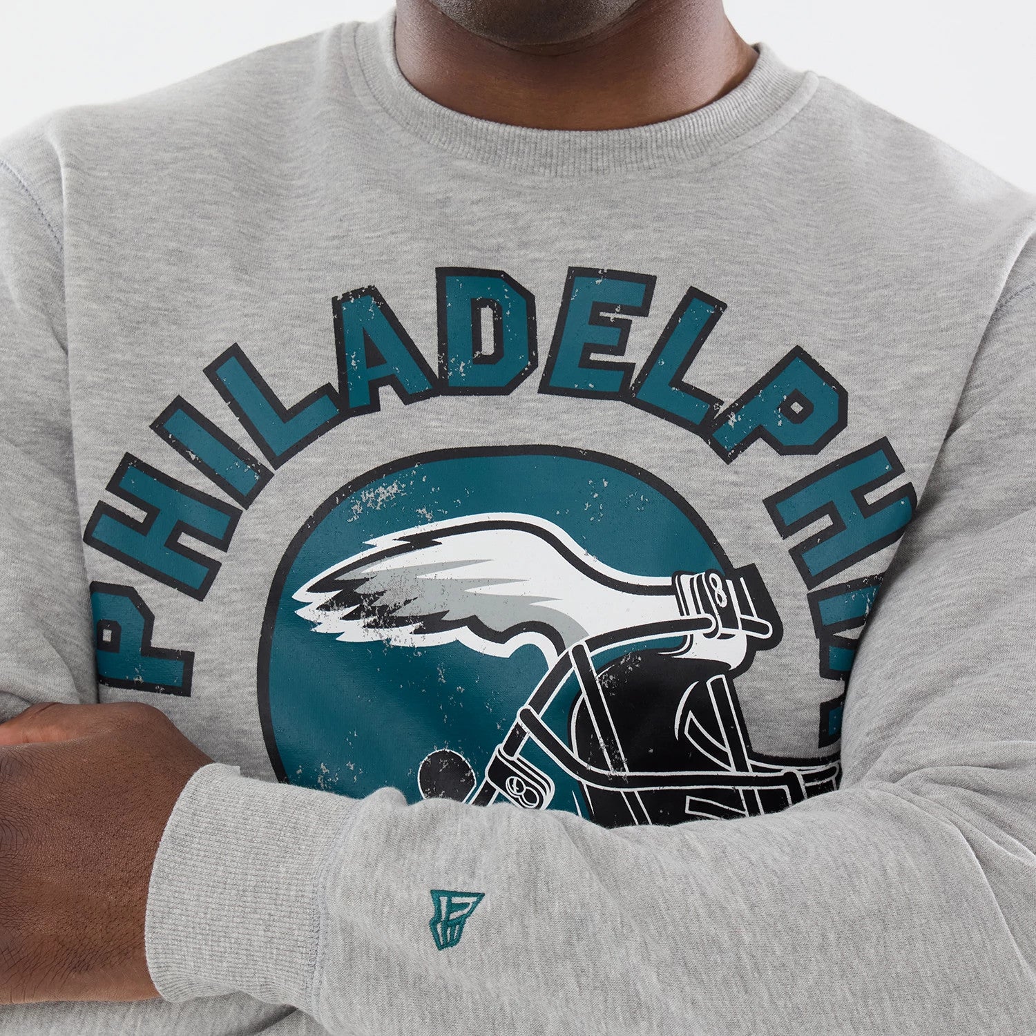 The model is wearing this NFL Training 2026 Philadelphia Eagles Crew Neck Sweater in grey. 3