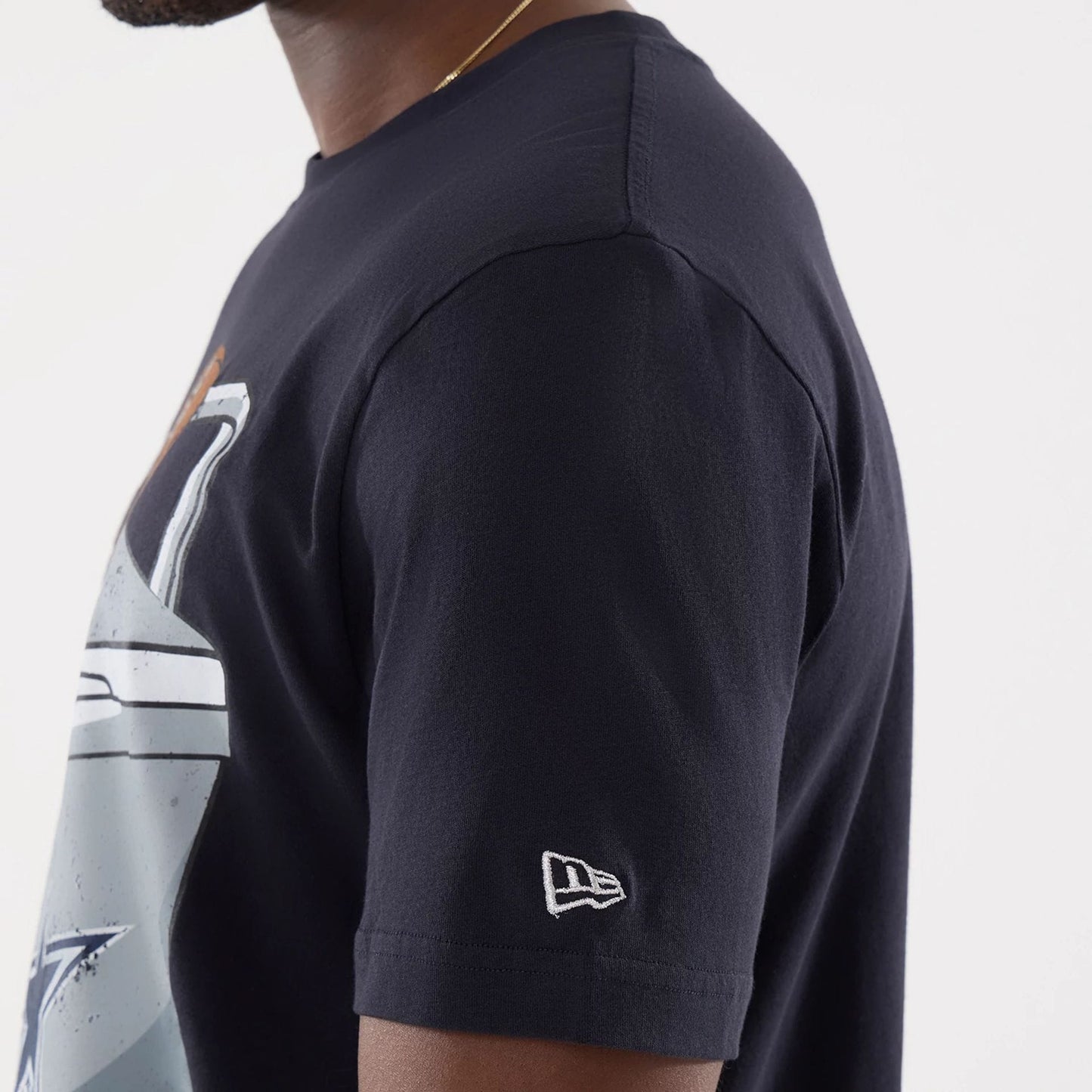 The model is wearing this NFL Training 2026 Dallas Cowboys T-Shirt in navy. 5