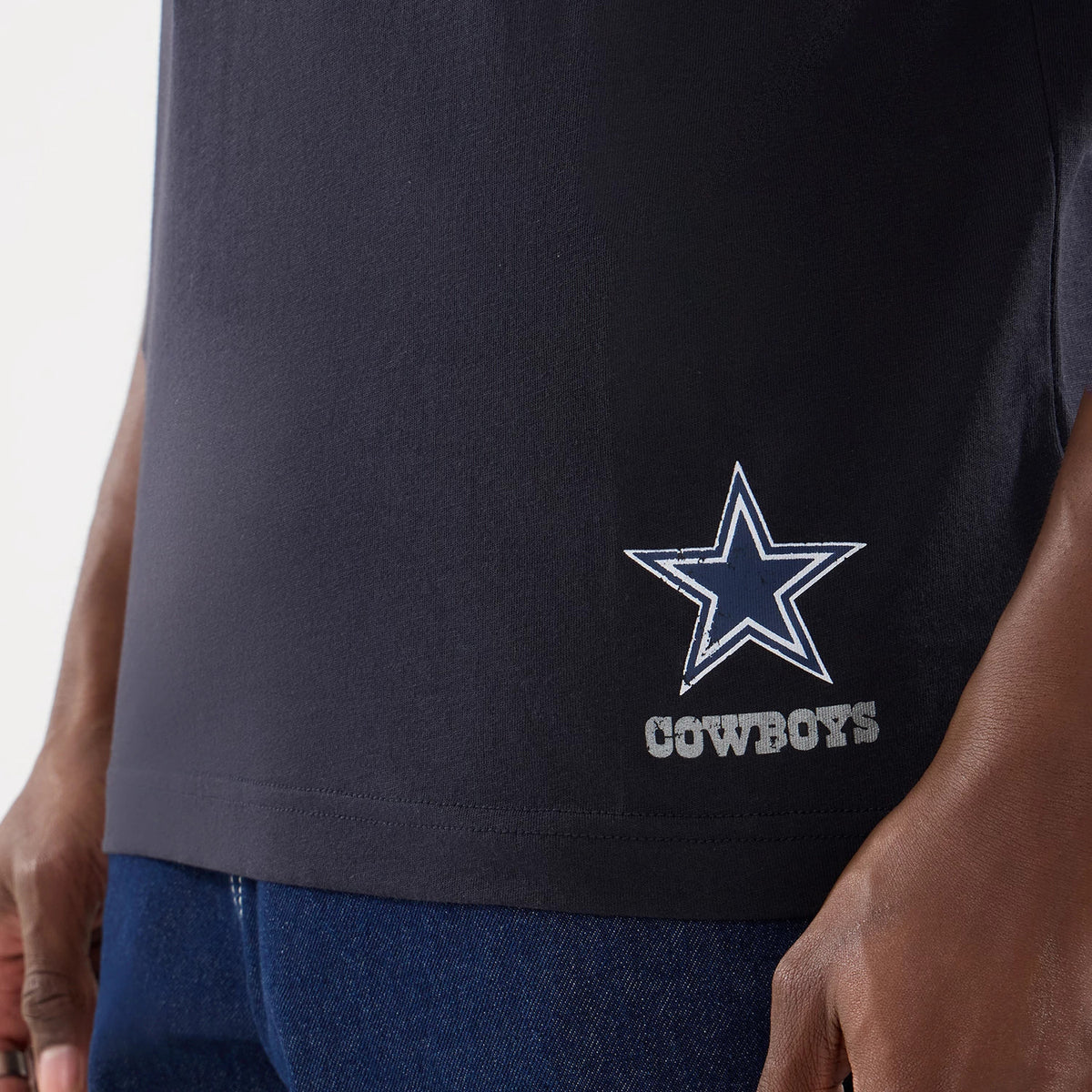The model is wearing this NFL Training 2026 Dallas Cowboys T-Shirt in navy. 6