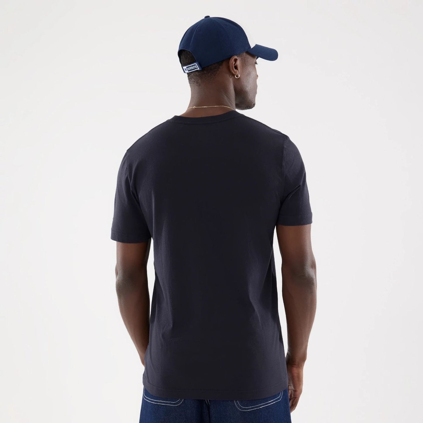 The model is wearing this NFL Training 2026 Dallas Cowboys T-Shirt in navy. 2