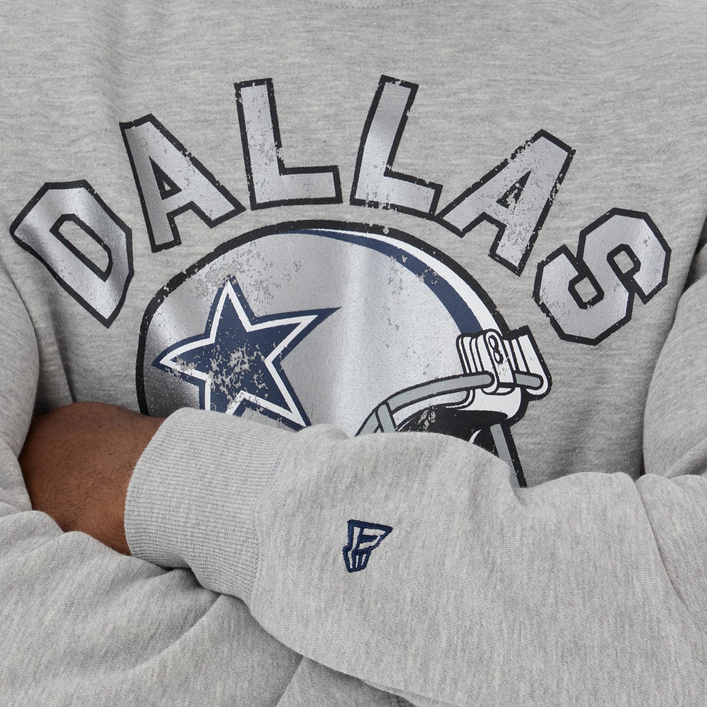 The model is wearing this NFL Training 2026 Dallas Cowboys Crew Neck Sweater in grey. 3