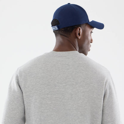 The model is wearing this NFL Training 2026 Dallas Cowboys Crew Neck Sweater in grey. 5