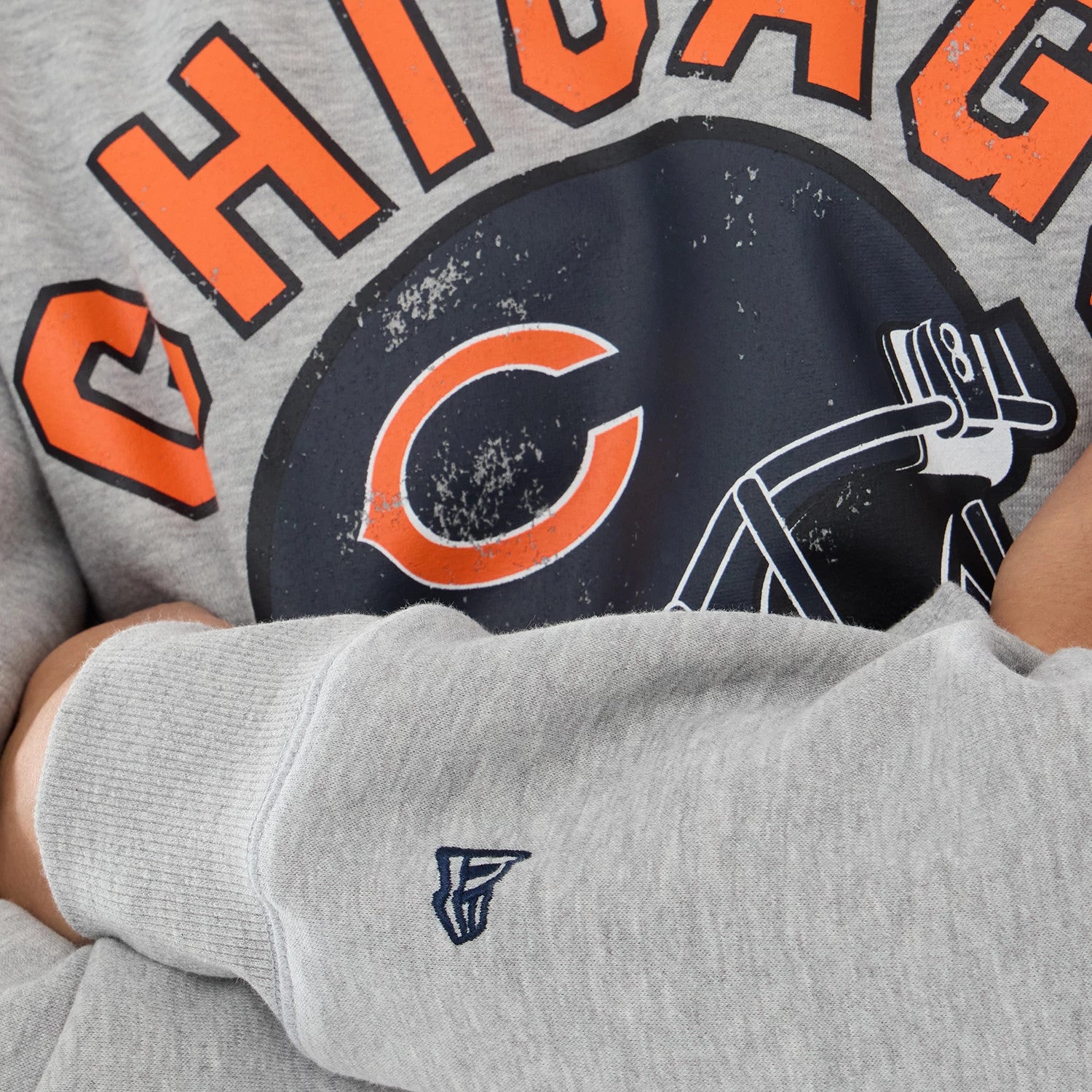 The model is wearing this NFL Training 2026 Chicago Bears Crew Neck Sweater in grey. 5