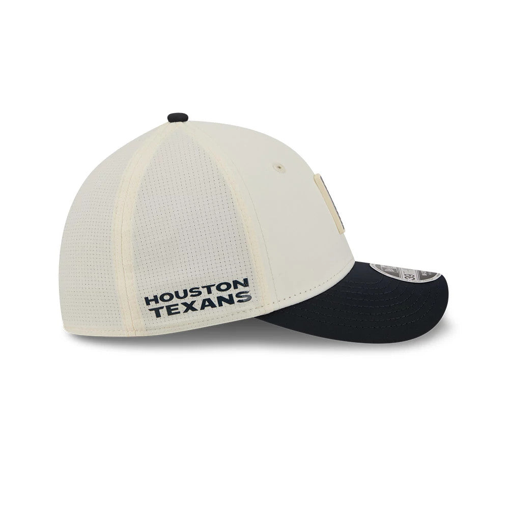 Houston Texans NFL Training 2026 White New Era 39THIRTY M-Crown Stretch Fit Cap, side view showing the white panels with navy embroidered Houston Texans text on the rear, a curved dark visor and a 39THIRTY size sticker.